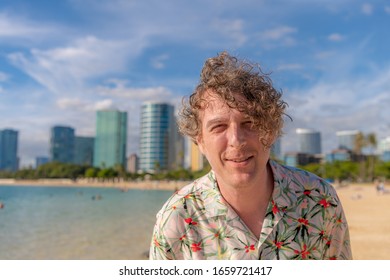 A Man Caught In Mid Sentence Talking While Posing For A Portrait, Visiting Honolulu, Hawaii.