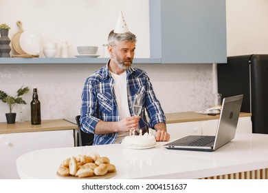 Man Is Celebrating His Birthday With Someone On The Skype Throught The Laptop