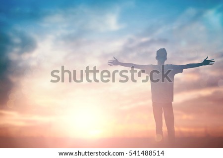 Man celebrating worship god in summer morning. Christian thought positive over sunset inspire praise for peace cross concept for freedom financial, vision and mission, self motivation, hope life love