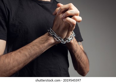 the man is in chains