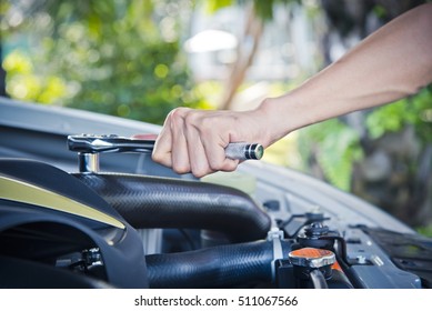 Man check and repair the car engine.  - Shutterstock ID 511067566