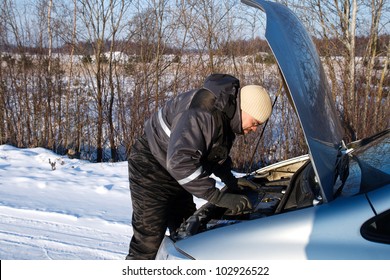 Man Checked The Broken Car Engine In Cold Winter Day