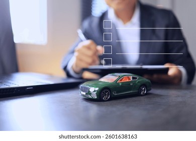 Man checking the check list to estimate the car for resale as a second-hand car or maintenance checkup.