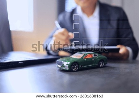 Man checking the check list to estimate the car for resale as a second-hand car or maintenance checkup.