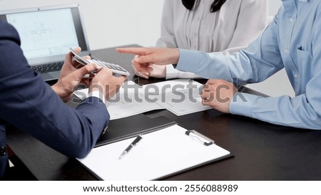 A man checking the estimated value of a property