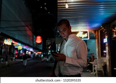 A man checking his phone after he got a call from someone. - Shutterstock ID 1520395535