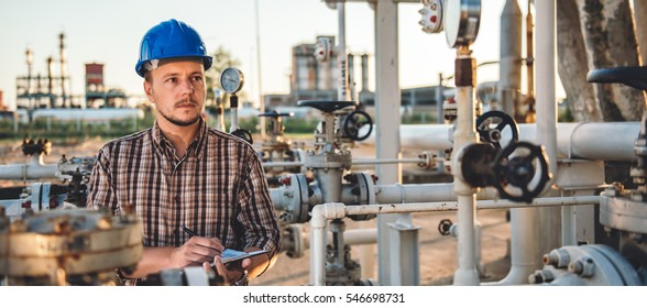 Man Checking Manometer In Natural Gas Factory