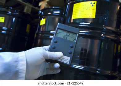 Man Checking Radiation With Geiger Counter