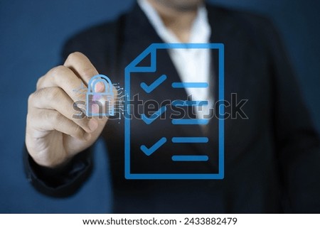 A man is checking the security of information. Anyone who uses digital signatures, file encryption