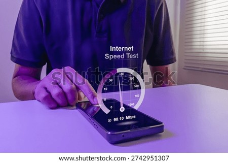 A man checking the speed of internet connection using his smartphone