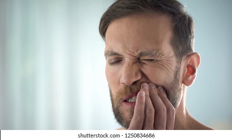 Man Checking Teeth In Front Of Mirror, Dental Disease, Gum Infection, Pulpitis