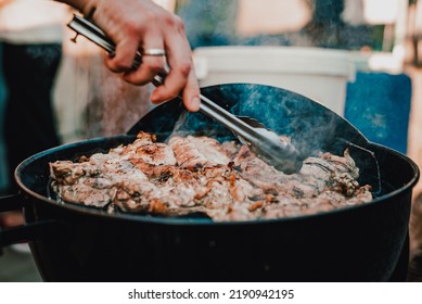 Man Chef Cooking Chicken Meat On Grill Outdoor