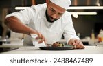 Man, chef and serious with plate in kitchen at restaurant for fine dining, meal and creativity. Male employee, professional and cooker with food for culinary, hospitality and catering service