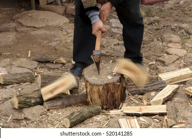 Man Chopping Fire Wood With Motion Blur