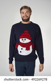 Man In Christmas Jumper With A Snowman