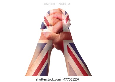 Man clasped hands patterned with the united kingdom flag