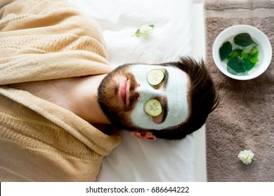 Man With A Clay Mask