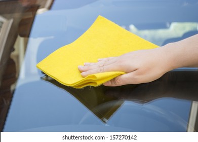 Man Cleaning Car Glass Front