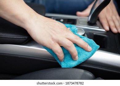 A Man Cleaning Car Interior