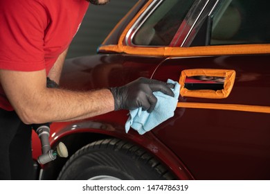 Man Cleaning Car With Microfiber Cloth,vintage Old Car Detailing Close Up