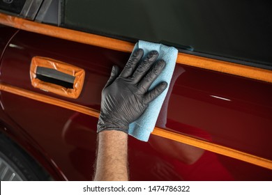 Man Cleaning Car With Microfiber Cloth,vintage Old Car Detailing Close Up