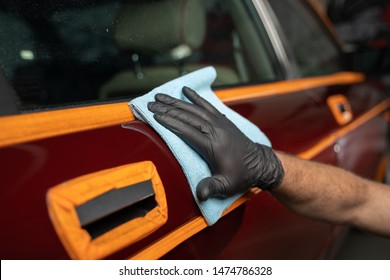 Man Cleaning Car With Microfiber Cloth,vintage Old Car Detailing Close Up