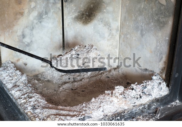 Man Cleaning Fireplace Ashes Stock Photo Edit Now 1033061635