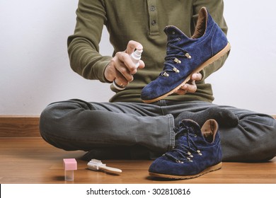 The Man Cleaning His Suede Shoes