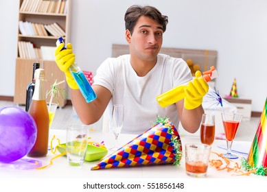 Man Cleaning The House After Christmas Party