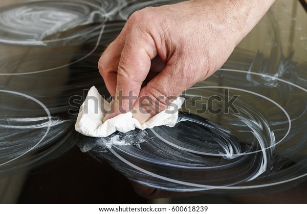 Man Cleaning Induction Stove Stock Photo Edit Now 600618239