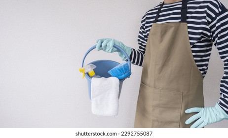 A man with a cleaning tool.