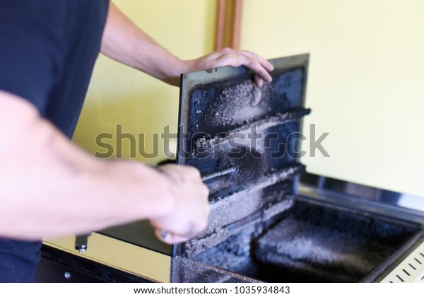 Man Cleaning Wood Burning Stove Cleaning Stock Photo Edit Now