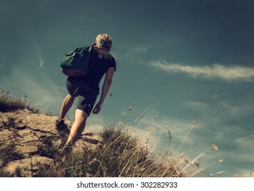 Man Climb On Mountain Hill