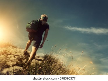 Man climb on mountain hill