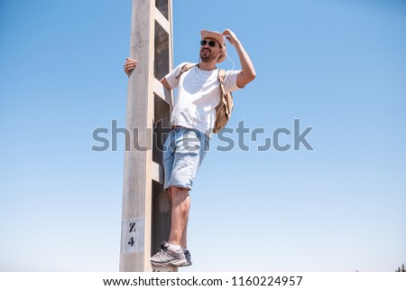 Similar – Image, Stock Photo man climbed a metal tower