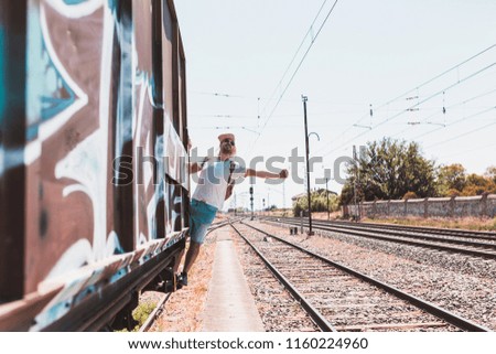 Similar – man traveling in train carriage