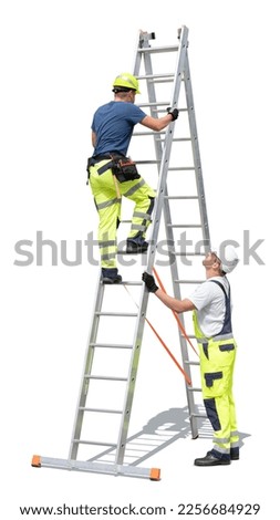 Man climbing up a ladder while the other worker watches out for his safety isolated on white background