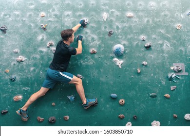 Man Climbing On Wall. Rock-climbing. Climbing Icon. Climbing Background.