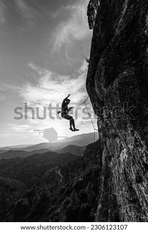 photographer in mountain at sunset