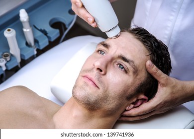 Man In A Clinic By Becoming A Beauty Treatment