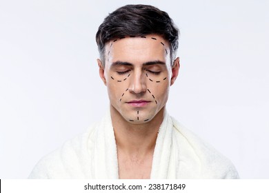 Man With Closed Eyes And Marked With Lines For Plastic Surgery