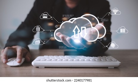 Man with cloud computing diagram show on hand. Cloud technology. Data storage. Networking and internet service concept.