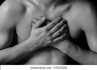 Man Is Clutching His Chest, Acute Pain Possible Heart Attack, Black And White Image