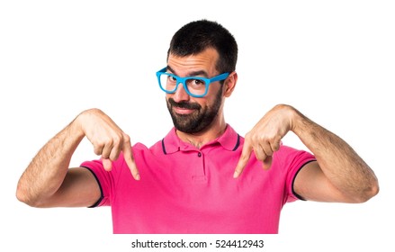 Man With Colorful Clothes Pointing Down