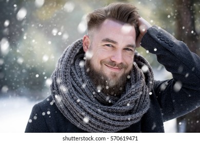 Man Combing His Hair In Winter