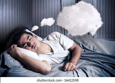 Man Comfortably Sleeping In His Bed At Night