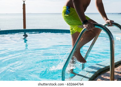 Man Coming Out Of Pool