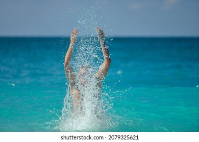 Man Coming Out Of The Water