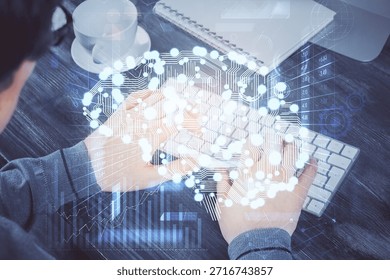 Man with computer background with brain theme hologram. Concept of brainstorm. Double exposure.