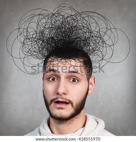Man with confusing tangle of thoughts